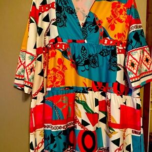 I’m selling never worn boutique dress size 2x with tags no label